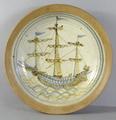 100. Large stoneware bowl with ship motif by Bryan Newman